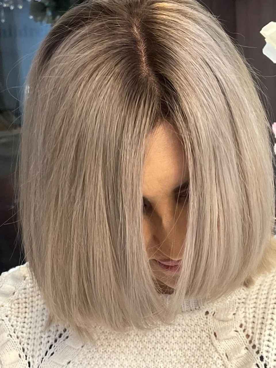 A sleek ash-blonde bob, coloured and cut in the salon